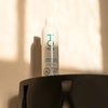 TO112 anti-humectant spray on wood table