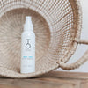 TO112 hair serum in wicker basket