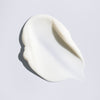 Swatch of white cream close up