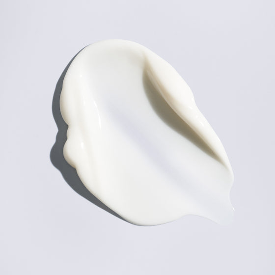 Swatch of white cream close up
